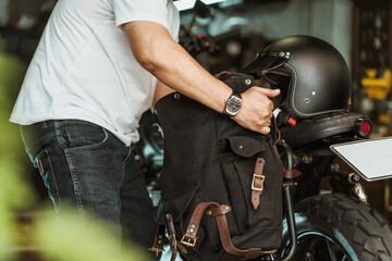 rider install a motorcycle saddlebag or side bag on luggage bracket  vintage motorbike motorcycle...