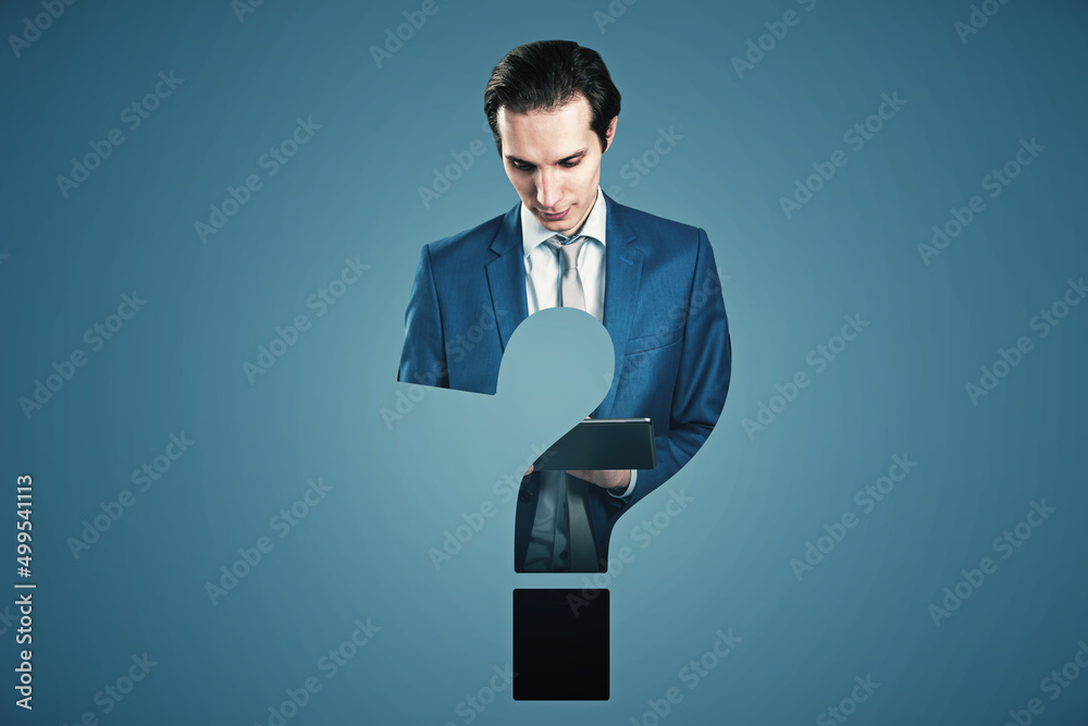 Poster abstract attractive european businessman with tablet and question mark shape on blue wall background