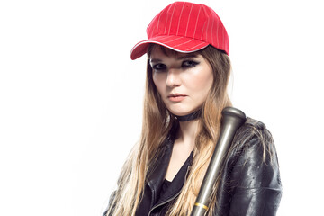 Sportive Caucasian Female Baseball Player Athlete Posing With Bat Stem While Wearing Red Cap And Black Leather Jacket Against Pure White Background.