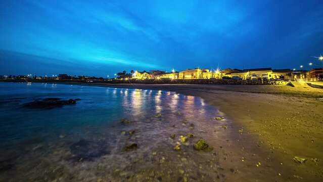 Static view of Spiaggia Marina Vecchia di Avola, Eloro District, Province of Syracuse, Sicily, Italy at night time in timelapse.