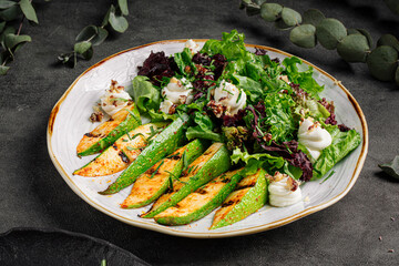 Portion of grilled zucchini salad with cottage cheese