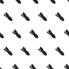Flying bombs regular symmetrical seamless pattern black and white background in a minimal style, aviation bombs falling at an angle military backdrop.