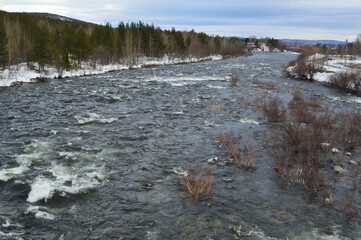 Landscape with river in April 