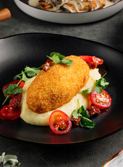 Gourmet chicken kiev cutlet with mashed potato