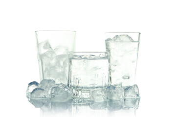 Glasses with water and ice isolated on white background