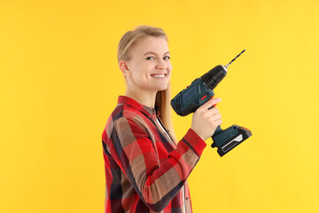 Concept of occupation, young woman on yellow background