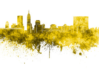 Indianapolis skyline in yellow watercolor on white background