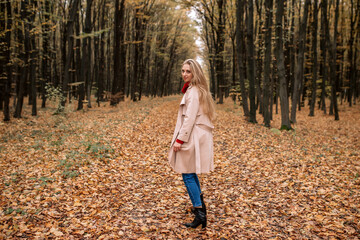 Beautiful girl, girl in a coat, girl in the woods