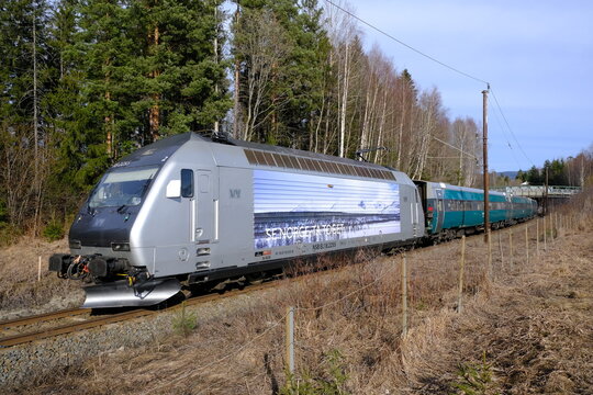 Vy Train From Oslo To Bergen Passing Honefoss, Buskerud, Norway