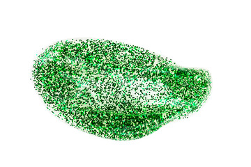 Abstract green glitter beauty smear isolated on white background. Holiday lip gloss or nail polish...