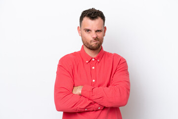 Young Brazilian man isolated on white background with unhappy expression