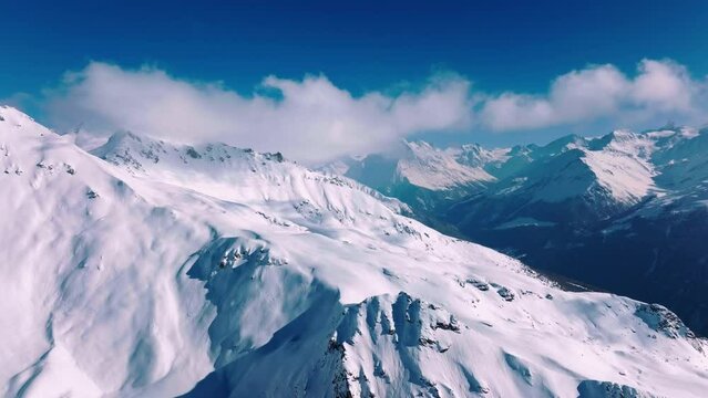 Snow-covered Becca de Lovegno Mountain In The Pennine Alps in Switzerland. - aerial