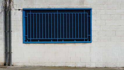 sidewalk industrial facade with window