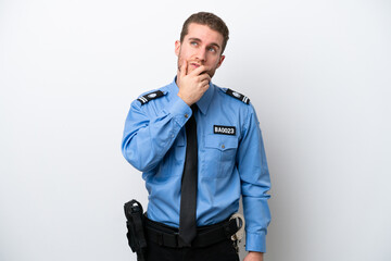 Young police caucasian man isolated on white background having doubts and with confuse face...