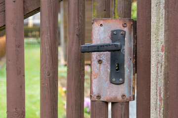 an old locked garden wooden door
