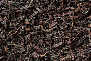 Black tea on white background. Top view. Close up. High resolution
