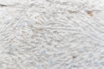 A pile of broken floor tiles on the floor of a construction site.  background a pile of broken concrete. top view. flat lay