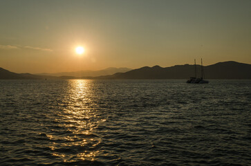 Panoramic view of the sunset on the Greek island of Evia in the Aegean Sea.