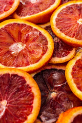 Fruit background with blood oranges and ice, delicious sweet fruit
