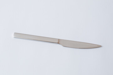 Stainless steel knife on white background, table knife