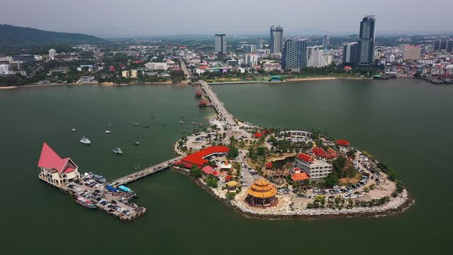 Aerial view of Ko Loi island, Sri Racha with ocean beach or sea, Chonburi skyline, Thailand.