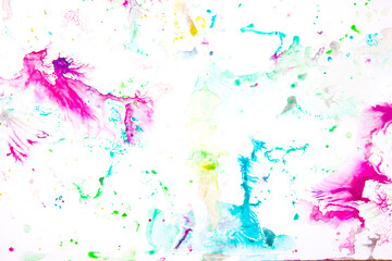 watercolor spots of yellow and blue on a white background. texture. bright spots and splashes of paint on the paper. 