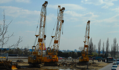 cranes on a construction site. details.