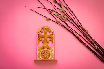 Willow branches on a pink background. Easter bouquet, blooming willow