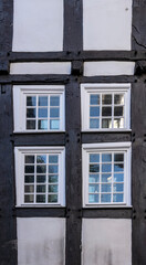 Obraz premium old half-timbered house facade with windows 