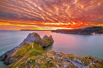 Three Cliffs Bay Sunset in the Gower, Swansea, South Wales - obrazy, fototapety, plakaty