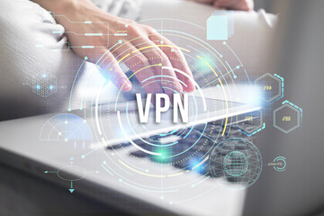 VPN, Virtual private network. Internet connection privacy concept. Modern laptop and user hand close-up view photo