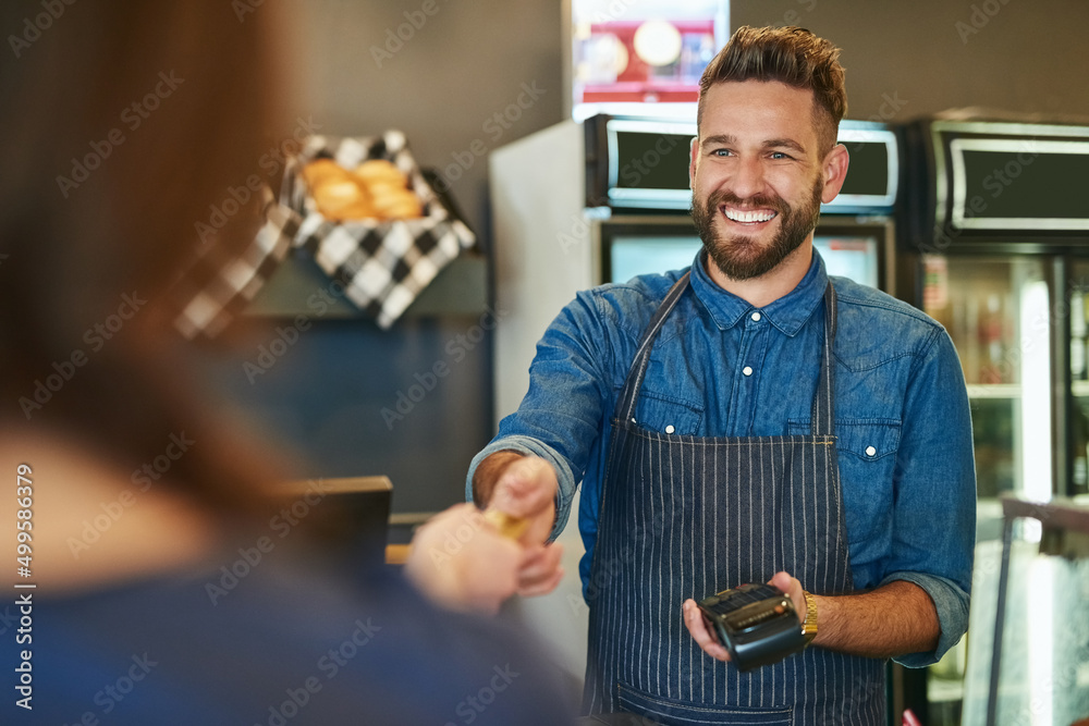Poster Transactions made quick and easy. Cropped shot of a waiter accepting a credit card payment from a customer.