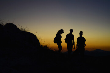 Fototapeta na wymiar Friends at sunset