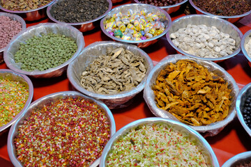 Indian variety of traditional mouth freshener in bowl for sale, mukhwas, poona, traditional Indian mouth freshener.