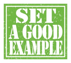 SET A GOOD EXAMPLE, text written on green stamp sign