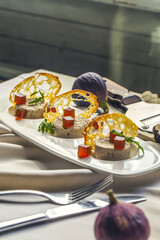 Foie Gras Pate, Truffle, Fig Jelly on White Plate, Served Table, Restaurant Food