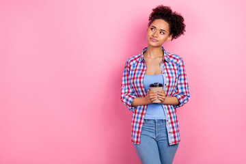 Photo of thinking brunette lady drink americano look advert wear blue shirt isolated on pink color background