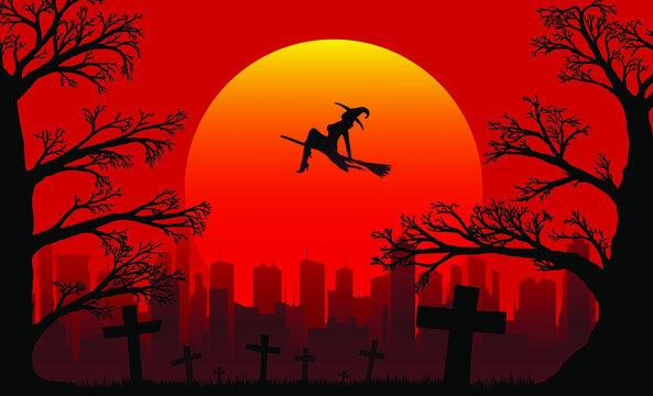 silhouette of a witch flying on a broomstick and old branchy oaks near the cemetery against the backdrop of the setting sun and the city in the distance