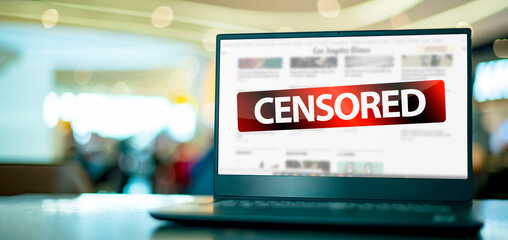 Laptop with the sign warning against censorship in social media - obrazy, fototapety, plakaty