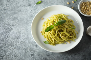 Traditional spaghetti with pesto sauce