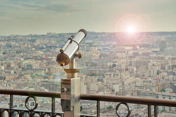 France - Paris - Paid spyglass (telescope) is ready on observation desk in the morning