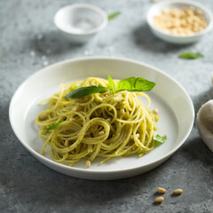 Traditional spaghetti with pesto sauce