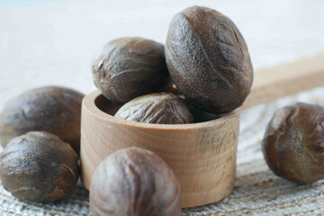 Ground nutmeg on table close up ,