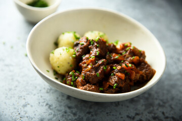 Beef goulash with potato dumplings