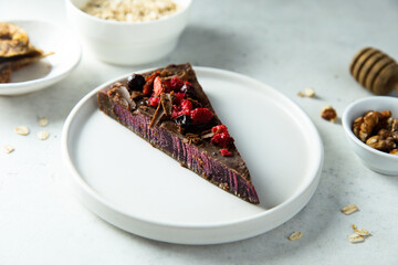 Vegan chocolate cake with wild berries