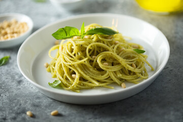 Traditional spaghetti with pesto sauce