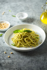 Traditional spaghetti with pesto sauce