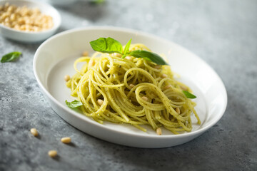 Traditional spaghetti with pesto sauce