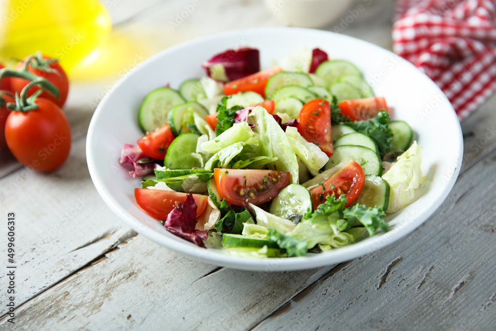 Sticker healthy green salad with tomato and cucumber