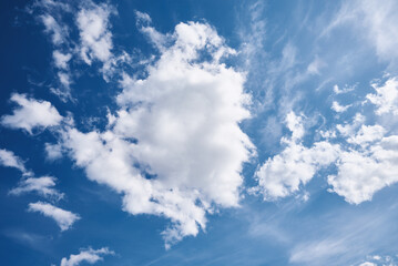 White cumulus clouds in blue sky, beautiful cloudscape background